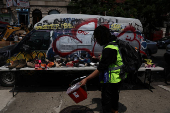 Member from OnPoint NYC cleans up syringes in Bronx, New York City