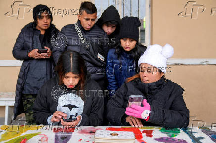 Denia Mendez from Honduras reacts to information that her appointment with CBP was canceled, in Piedras Negras