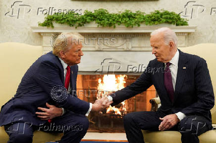 U.S. President Joe Biden meets with President-elect Donald Trump in the Oval Office at the White House in Washington