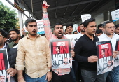 Student wing of the Indian National Congress protest against Indian industrialist Gautam Adani