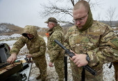 Ukrainian civilians undergo basic military training in Kharkiv