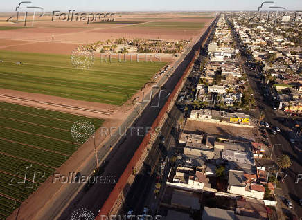 View of the wall on the United States and Mexico border in Mexicali