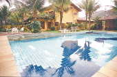 Casa com piscina, em Camburi, litoral