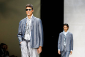 A model presents a creation from the Giorgio Armani Spring/Summer 2025 collection during Men's Fashion Week in Milan