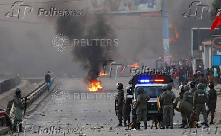 Mozambique's ruling party retains power in contested election