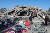 Aftermath of an Israeli strike on a house, in Deir Al-Balah in the central Gaza Strip