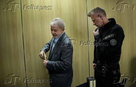 Lula ao lado do agente da Polcia Federal Jorge Chastalo Filho