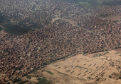 An aerial view shows houses and agricultural land in Cairo