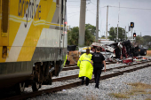 Brightline passenger train collides with fire truck on railtracks in Delray Beach