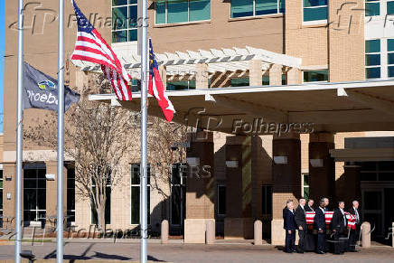 Former U.S. President Carter's casket travels to Atlanta, Georgia