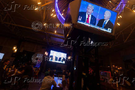 American citizens living in Mexico gather to watch the first debate between the two candidates for U.S. President in Mexico City