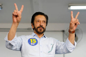 Sao Paulo Center-right incumbent Mayor Ricardo Nunes gestures while voting at a polling station during the municipal elections in Sao Paulo