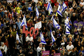 People rally demanding the release of hostages kidnapped during the deadly October 7, 2023 attack, in Tel Aviv