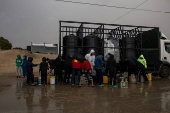 Heavy rain flooded tents in Khan Yunis camp