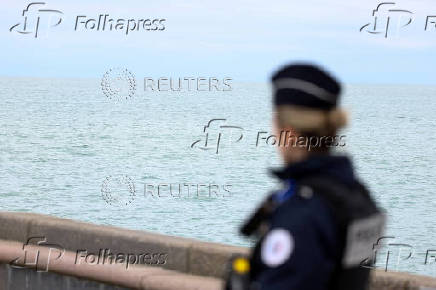 Security and rescue forces are seen on the beach of Wimereux, near Calais