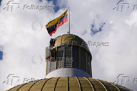 FILE PHOTO: Members of the National Assembly attend a session in Caracas