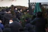 Members of the Corruption Investigation Office for High-ranking Officials gather in front of the impeached South Korean President Yoon Suk Yeol's official residence