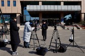 Members of the media report infront of the Corruption Investigation Office for High-ranking Officials while awaiting arrival of impeached South Korean President Yoon Suk Yeol in Gwacheon