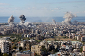 Smoke billows in Beirut's southern suburbs, after an Israeli strike