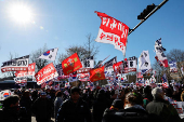 Impeached South Korean President Yoon Suk Yeol's supporters rally near the Corruption Investigation Office for High-ranking Officials, following his arrest, in Gwacheon