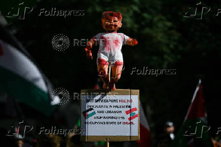 People demonstrate in support of Palestinians in Gaza, in London