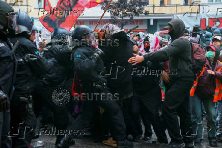 Protesters attend a demonstration in support of Palestinians, in Berlin