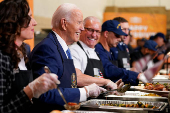 U.S. President Biden attends a dinner with U.S. service members and their families ahead of Thanksgiving at U.S. Coast Guard Sector New York on Staten Island