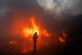 Palisades Fire burns during a windstorm on the west side of Los Angeles