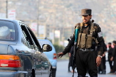 Afghans Taliban conduct checks on people and vehicles at checkpoints in Kabul