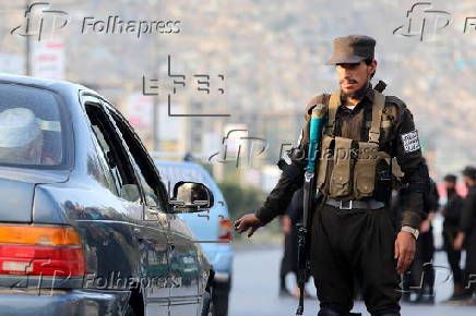 Afghans Taliban conduct checks on people and vehicles at checkpoints in Kabul