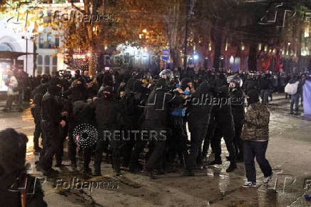 Supporters of Georgia's opposition attend a rally to protest, after government halts EU application until 2028, in Tbilisi