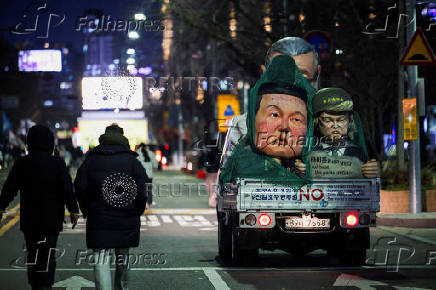 Protesters take part in a rally calling for the impeachment of South Korean President Yeol, in Seoul