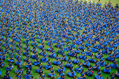 Participants wearing colourful attire, perform Bharatanatyam dance at the Jawaharlal Nehru International Stadium, in Kochi