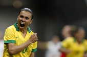 Marta comemora seu gol durante partida contra os EUA