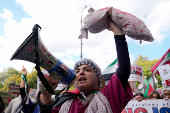 People demonstrate in support of Palestinians in Gaza, in London