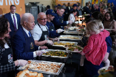 U.S. President Biden attends a dinner with U.S. service members and their families ahead of Thanksgiving at U.S. Coast Guard Sector New York on Staten Island