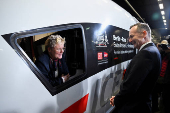 First direct high-speed ICE train is sent off from Berlin to Paris