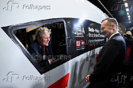 First direct high-speed ICE train is sent off from Berlin to Paris