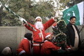 Pakistan's Christian minority dressed up as Santa hold rally in Peshawar