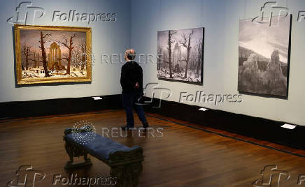 A man watchs painting at the exhibition ?Caspar David Friedrich: Infinite Landscapes? in Berlin