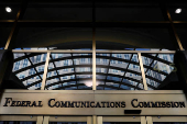 FILE PHOTO: Signage is seen at the headquarters of the Federal Communications Commission in Washington, D.C.