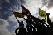 Houthi supporters protest againt the US and Israel in Sana'a