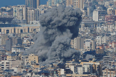 Smoke billows over Beirut's southern suburbs, after an Israeli strike