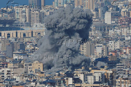 Smoke billows over Beirut's southern suburbs, after an Israeli strike