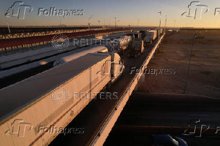 Trucks queue to cross into the United States at Zaragoza-Ysleta border crossing, in Ciudad Juarez