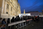 People walk through the Holy Door at Rome's Basilica of Saint Mary Major