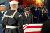 South Korean Consul General to Atlanta Sangpyo Suh, attends to view the casket of former President Jimmy Carter as he lies in repose at the Jimmy Carter Presidential Library and Museum in Atlanta