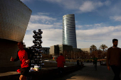 A car passes an Iberdrola electrical substation in Santurce, port of Bilbao