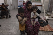 People receive treatment at Al-Najjar Hospital following an Israeli airstrike