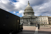 Police vehicles are parked outside the US Capitol building in Washington